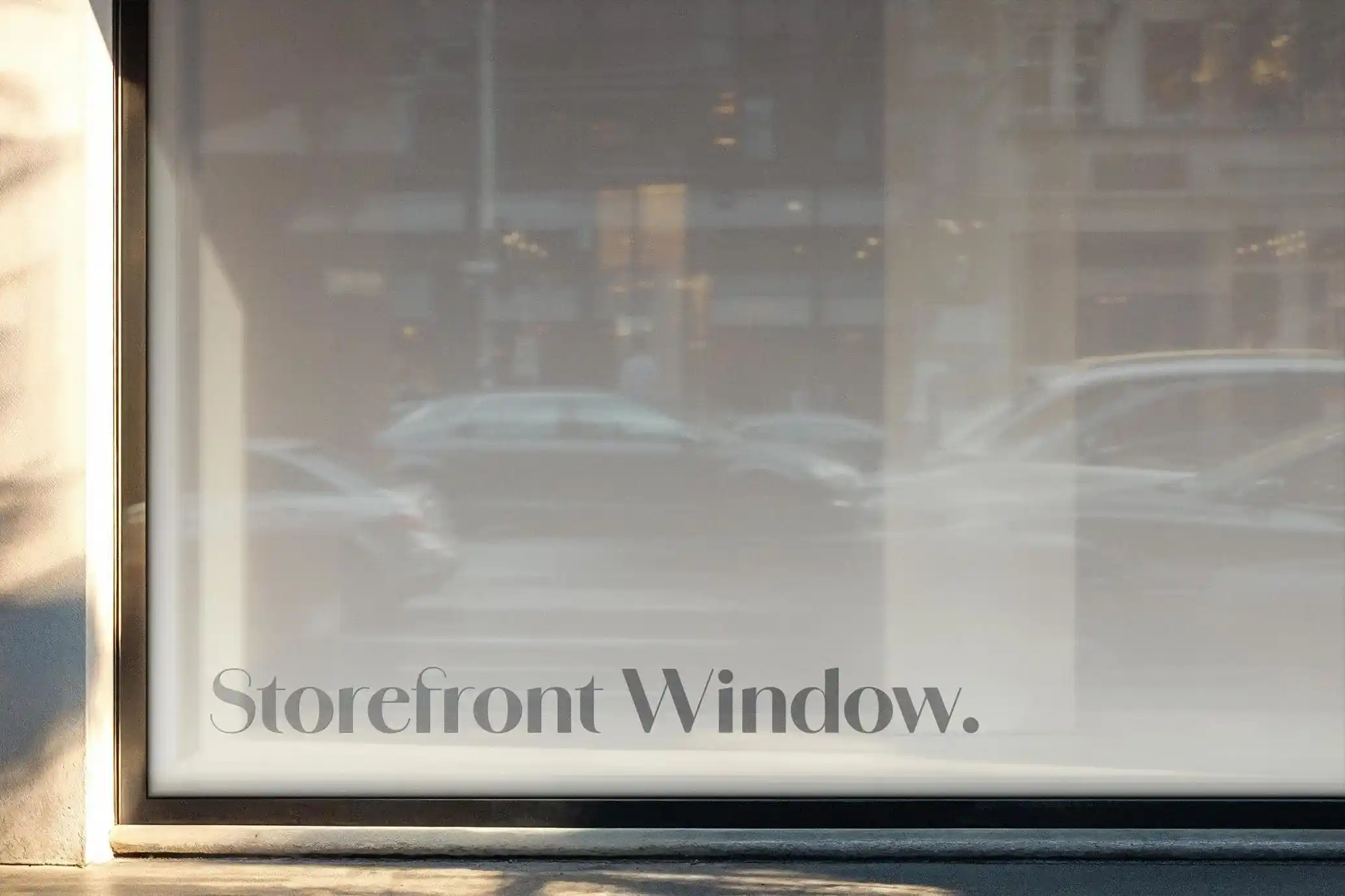 Free-Storefront-Window-Sticker-Mockup-PSD.webp